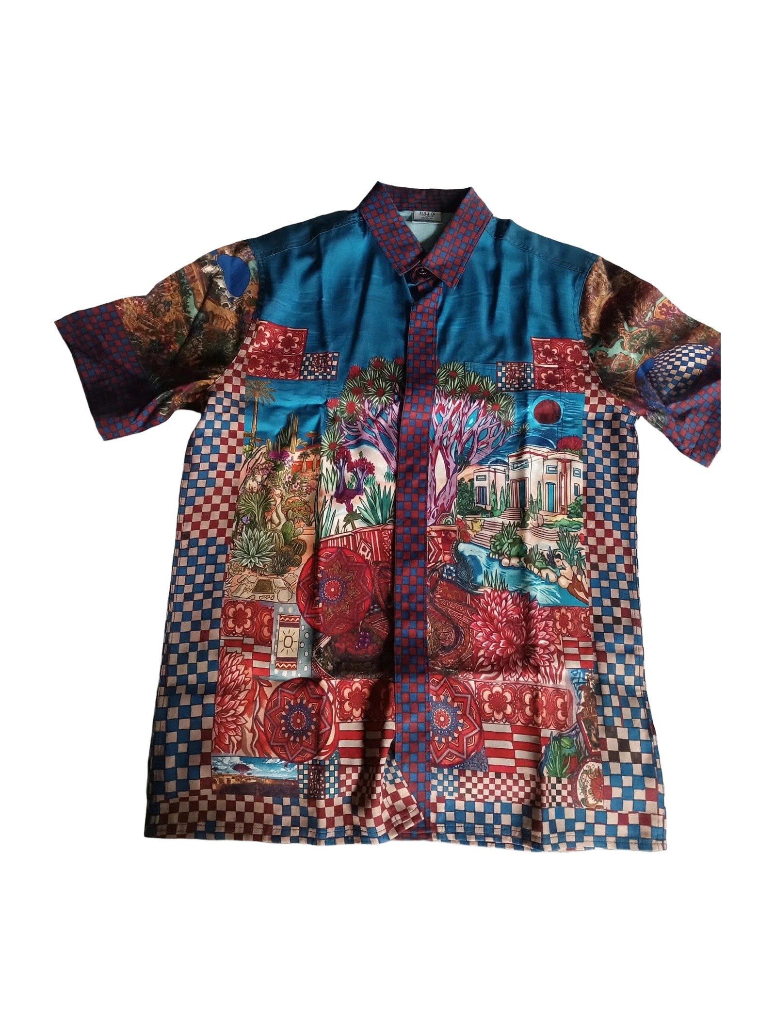 DARO Casbah Resort Shirt | Hand-Drawn Old City Kasbah Walled Citadel Fortress Architecture Islamic Domes Minarets Desert Sand Dune Padang Pasir Turquoise Oasis Waterfall Socotra Dragon Blood Tree Shisha Hookah Teapot Butterflies Succulents Checkered Border | Vintage Classic Heritage Timeless Storytelling Wearable Art Quiet Luxury Old Money Camp Collar Resort Shirt 1 of 1 Human Made Wearable Art 2026 by Kurt Wollton DARO Studio