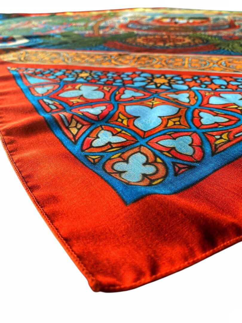 Escape Moorish Square Scarf | Hand-Drawn Moorish Riad Palace Architecture Pointed Zellige Tile Arches Green & White Checkered Patio Turquoise Courtyard Swimming Pool Lounge Chair Fruiting Date Palms Potted Cacti & DARO EST 2021 Plaque in Burnt Orange Border | Escape Calm Peaceful Sanctuary Oasis Quiet Luxury Old Money Bawal Eksklusif Tudung Seni 1 of 1 Human Made Luxury Resort Scarf 2026 by Kurt Wollton DARO Studio